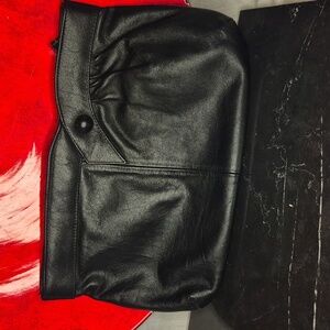 P24- Chic Black Leather Clutch